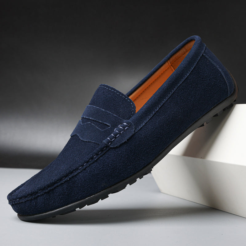 Men's slip-on loafers with moc toes, penny straps and stitched edging in navy and red colourways