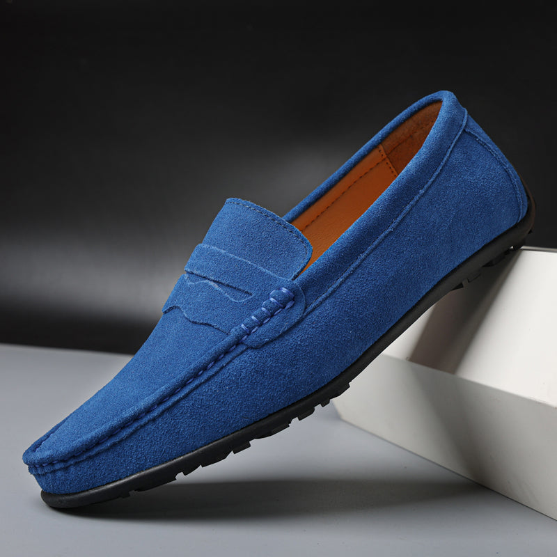 Men's slip-on loafers with moc toes, penny straps and stitched edging in navy and red colourways