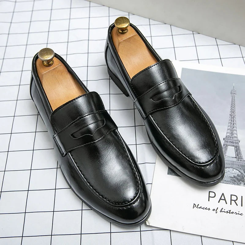 Men's penny loafers with a vamp band, almond toe and low heel