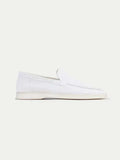 Men's white slip-on loafers with moc toe stitching and flat soles