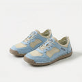 Low-profile lace-up sneakers with mesh panels and contrast stitched overlays