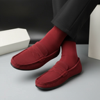 Men's slip-on loafers with rounded moc toes and penny strap detail