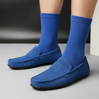 Men's slip-on loafers with rounded moc toes and penny strap detail