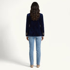 Women's navy velvet blazer with notched lapels, long sleeves and button front