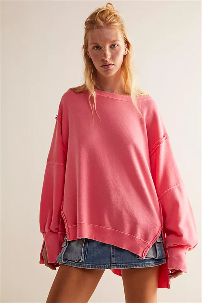 Women's oversized sweatshirt with balloon sleeves, exposed seams and side slits