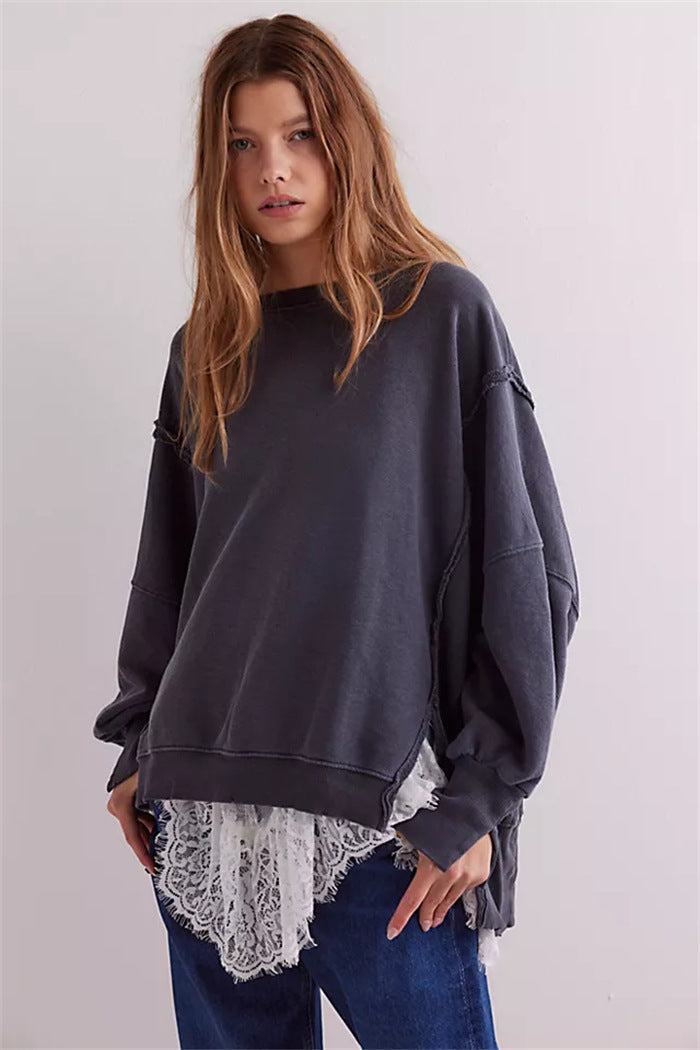 Women's oversized sweatshirt with balloon sleeves, exposed seams and side slits
