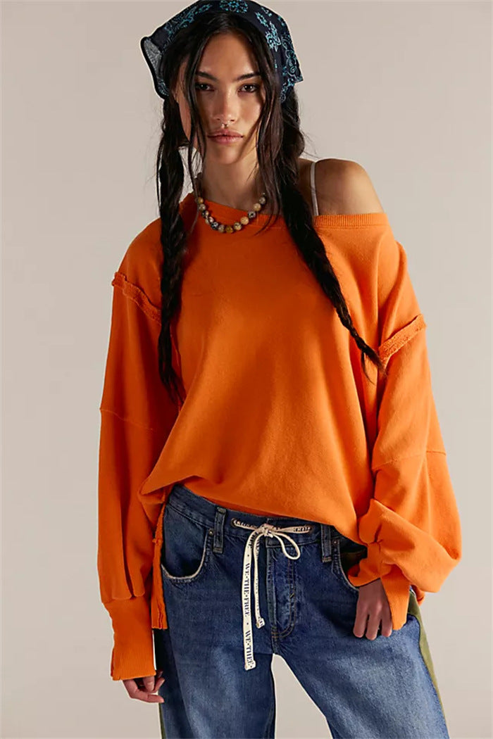 Women's oversized sweatshirt with balloon sleeves, exposed seams and side slits