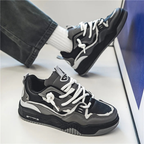 Men's panelled lace-up trainers with contrasting overlays and chunky flat soles