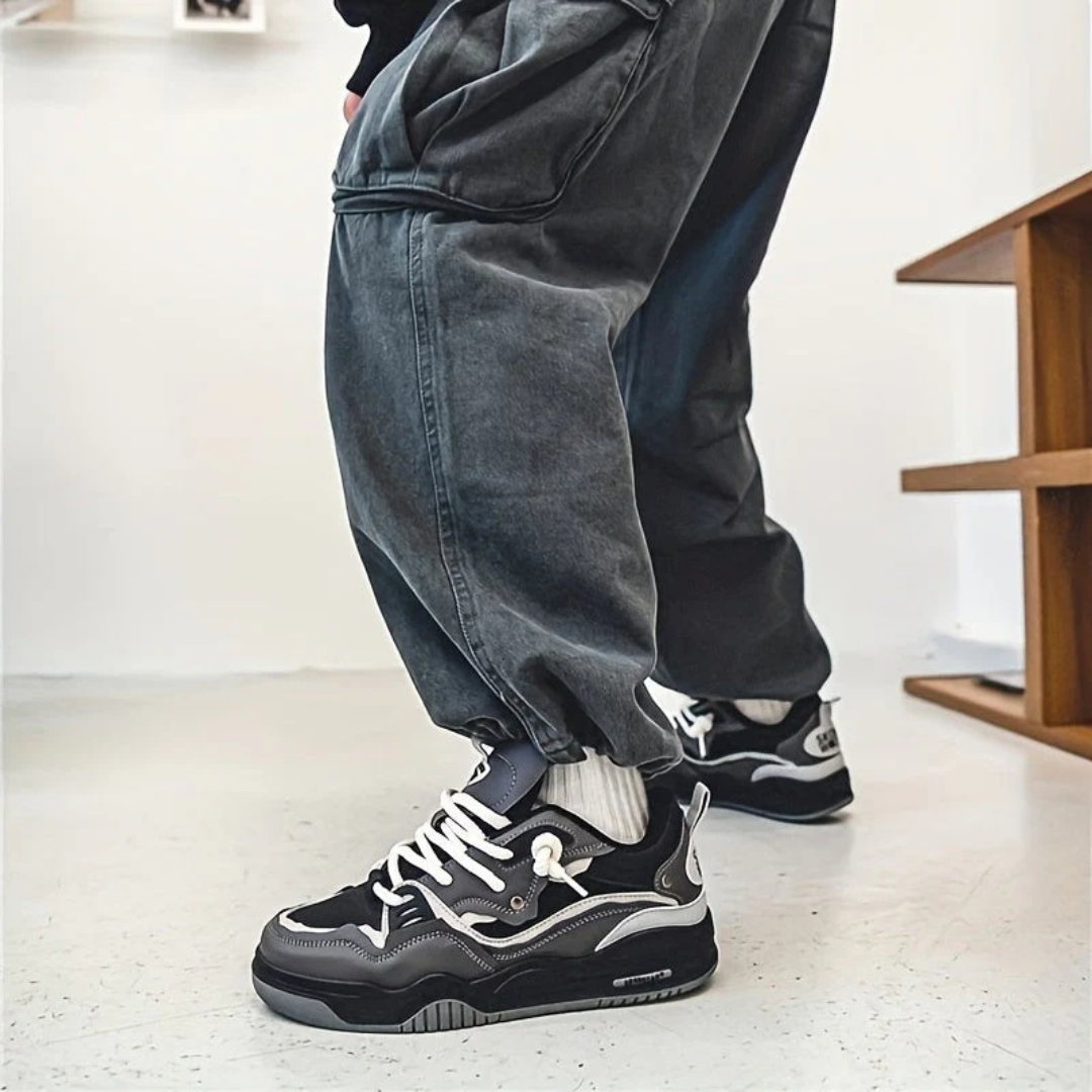 Men's panelled lace-up trainers with contrasting overlays and chunky flat soles