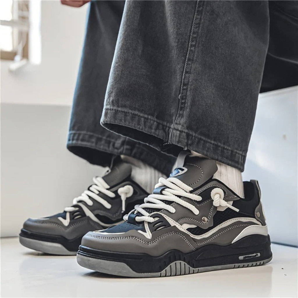 Men's panelled lace-up trainers with contrasting overlays and chunky flat soles
