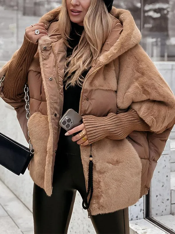 Women's hooded quilted puffer jacket with textured panels and ribbed cuffs
