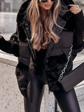 Women's hooded quilted puffer jacket with textured panels and ribbed cuffs