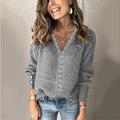 Women's ribbed V-neck jumper with button front and long sleeves