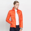 Women's quilted padded jacket with stand collar and long sleeves
