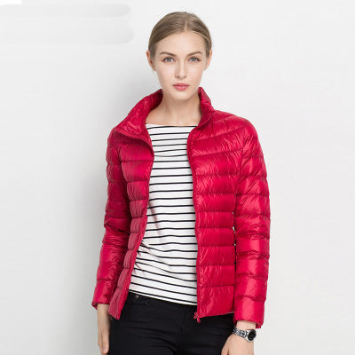 Women's quilted padded jacket with stand collar and long sleeves