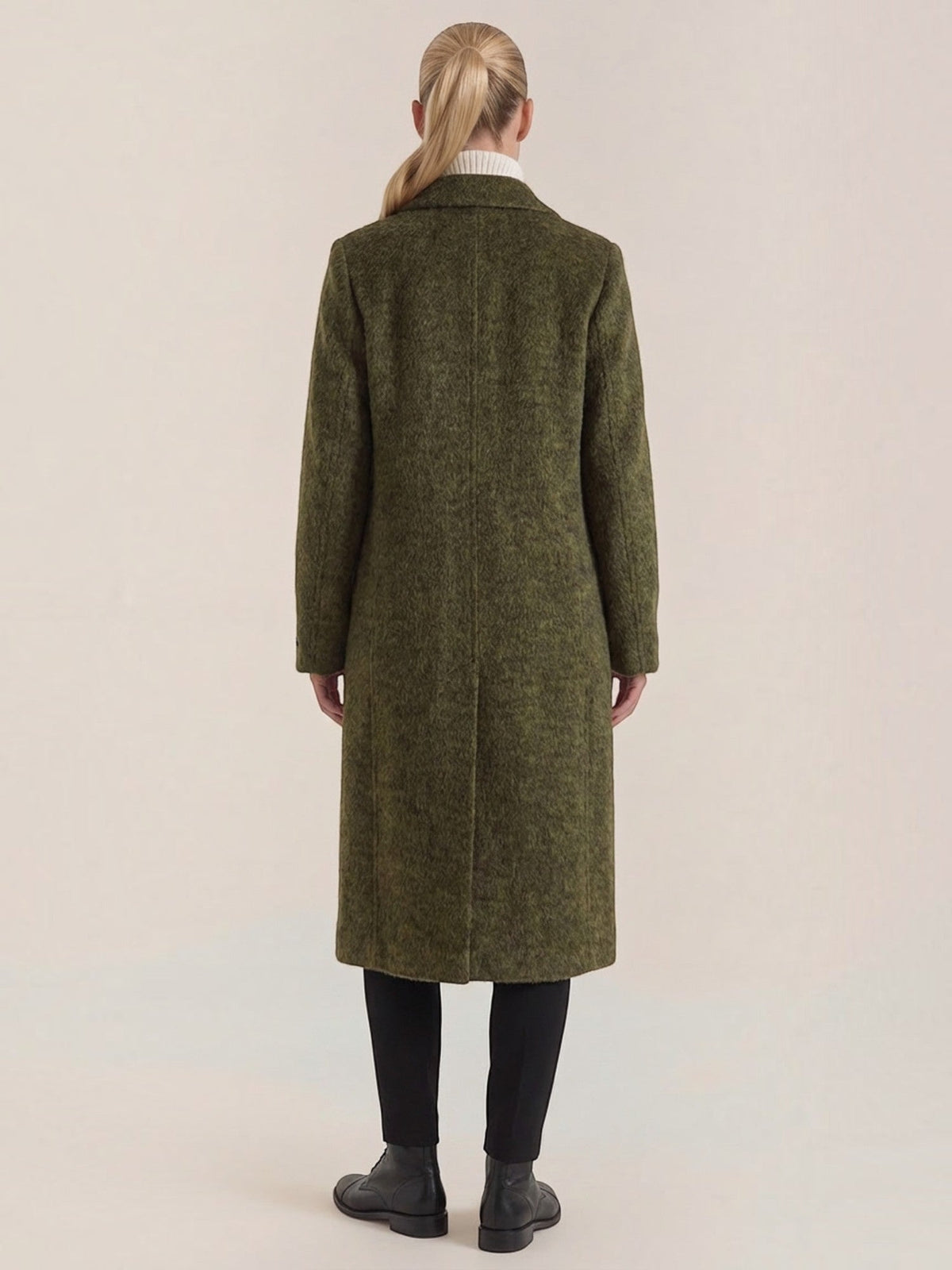 Women's long double-breasted coat with notched lapels and flap pockets