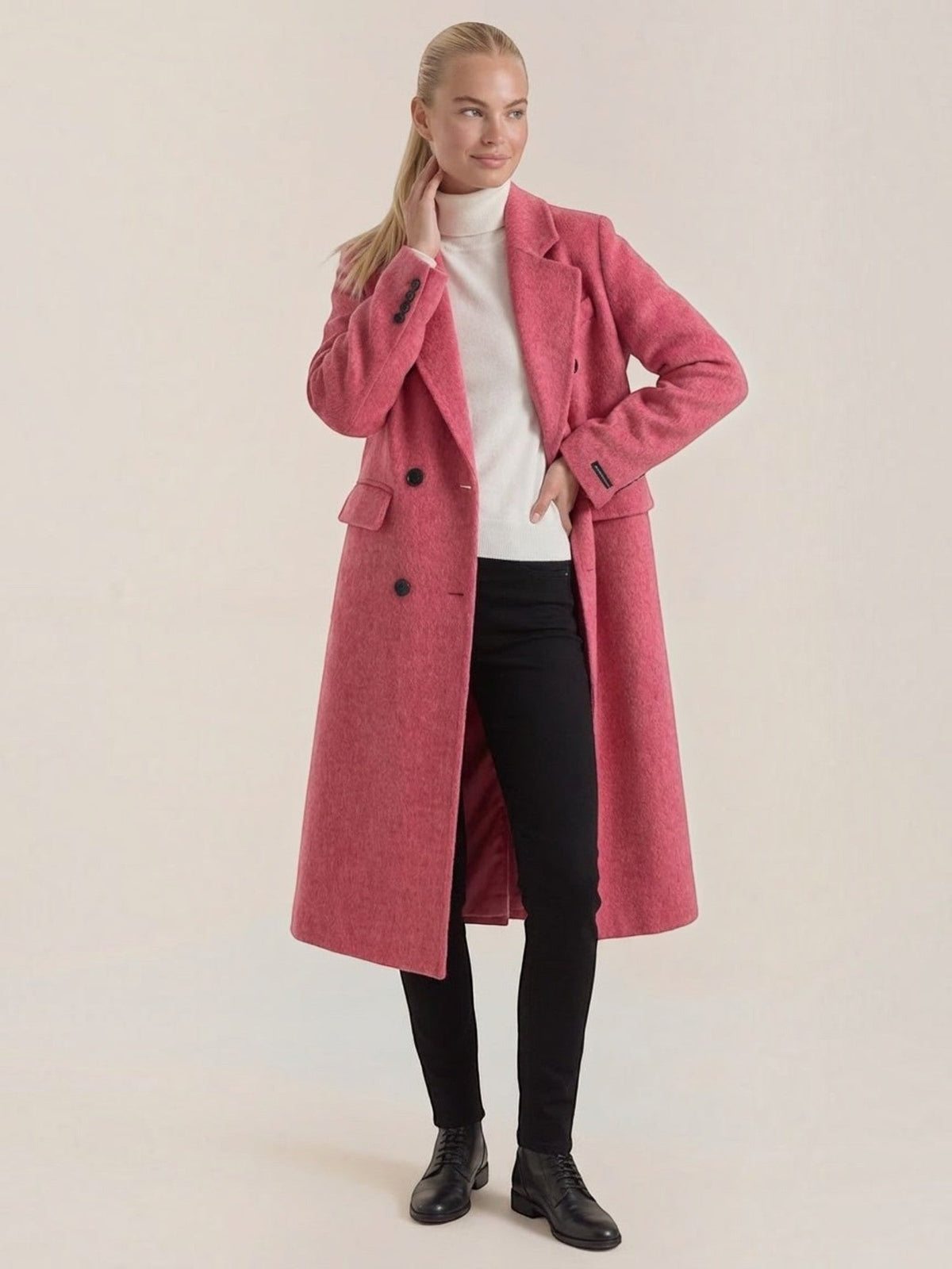 Women's long double-breasted coat with notched lapels and flap pockets