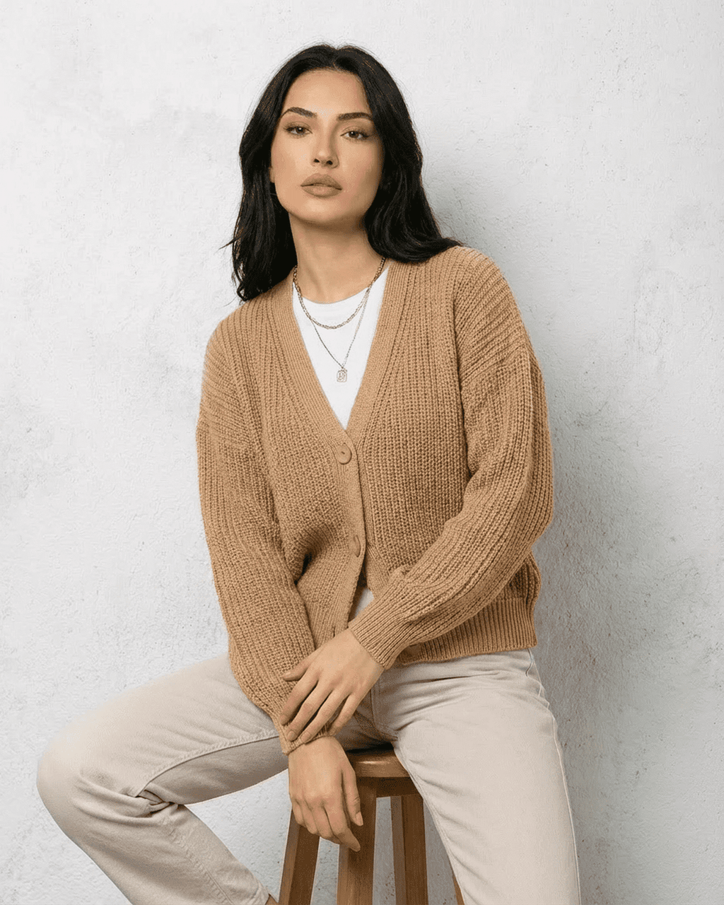 Women's beige ribbed V-neck cardigan with long sleeves and button fastening