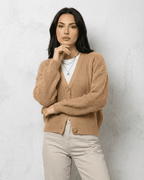 Women's beige ribbed V-neck cardigan with long sleeves and button fastening