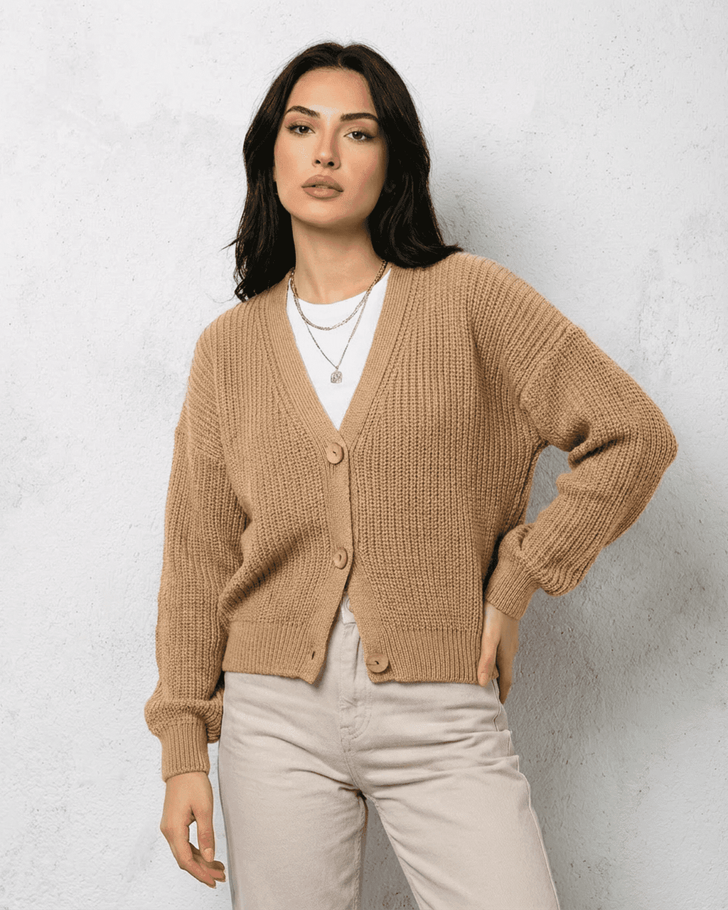 Women's beige ribbed V-neck cardigan with long sleeves and button fastening