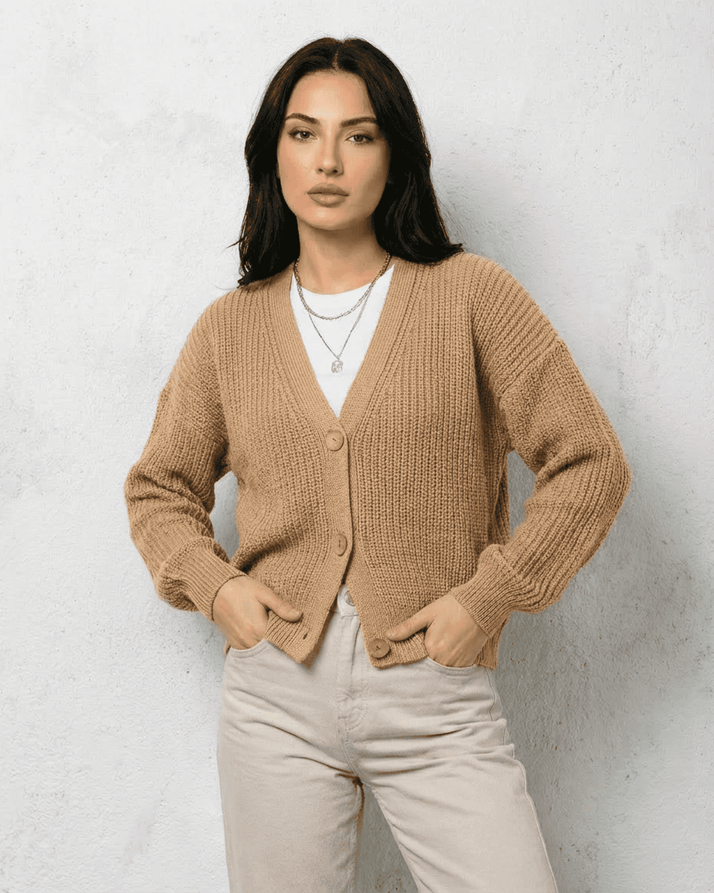 Women's beige ribbed V-neck cardigan with long sleeves and button fastening