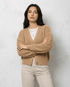 Women's beige ribbed V-neck cardigan with long sleeves and button fastening