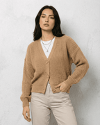 Women's beige ribbed V-neck cardigan with long sleeves and button fastening