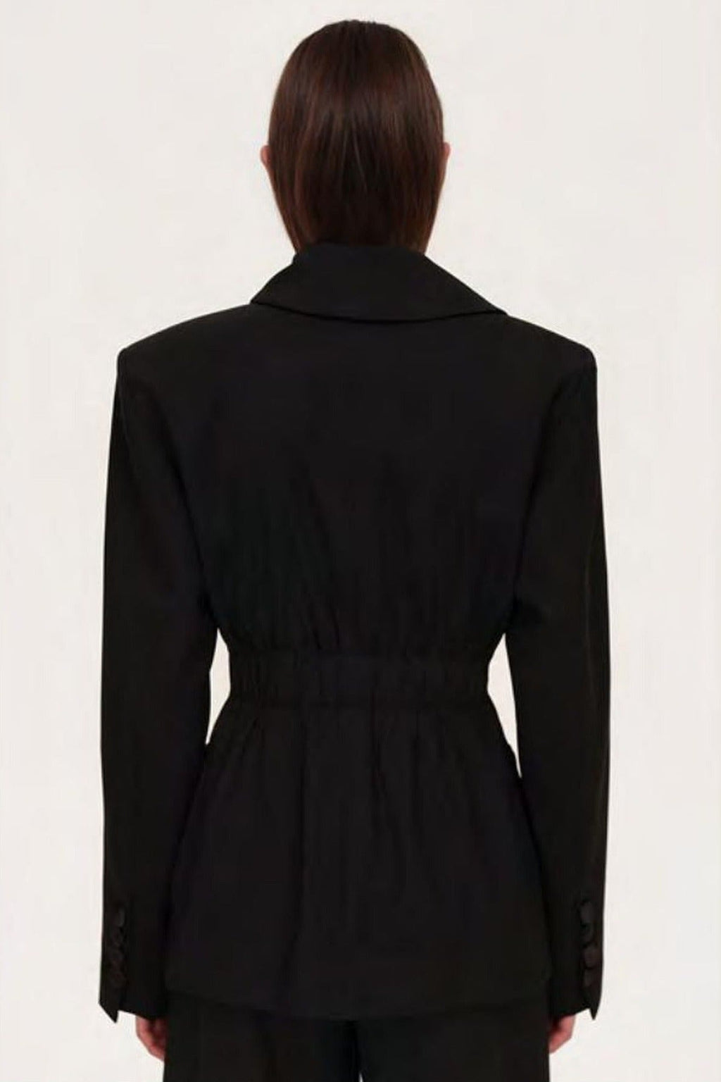 Women's black sculpted blazer with notched lapels and long sleeves