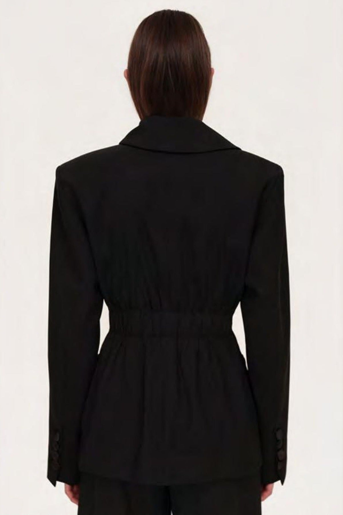 Women's black sculpted blazer with notched lapels and long sleeves