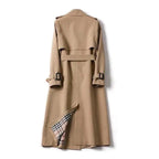 Women's long double-breasted belted trench coat with lapels and cuff buckles