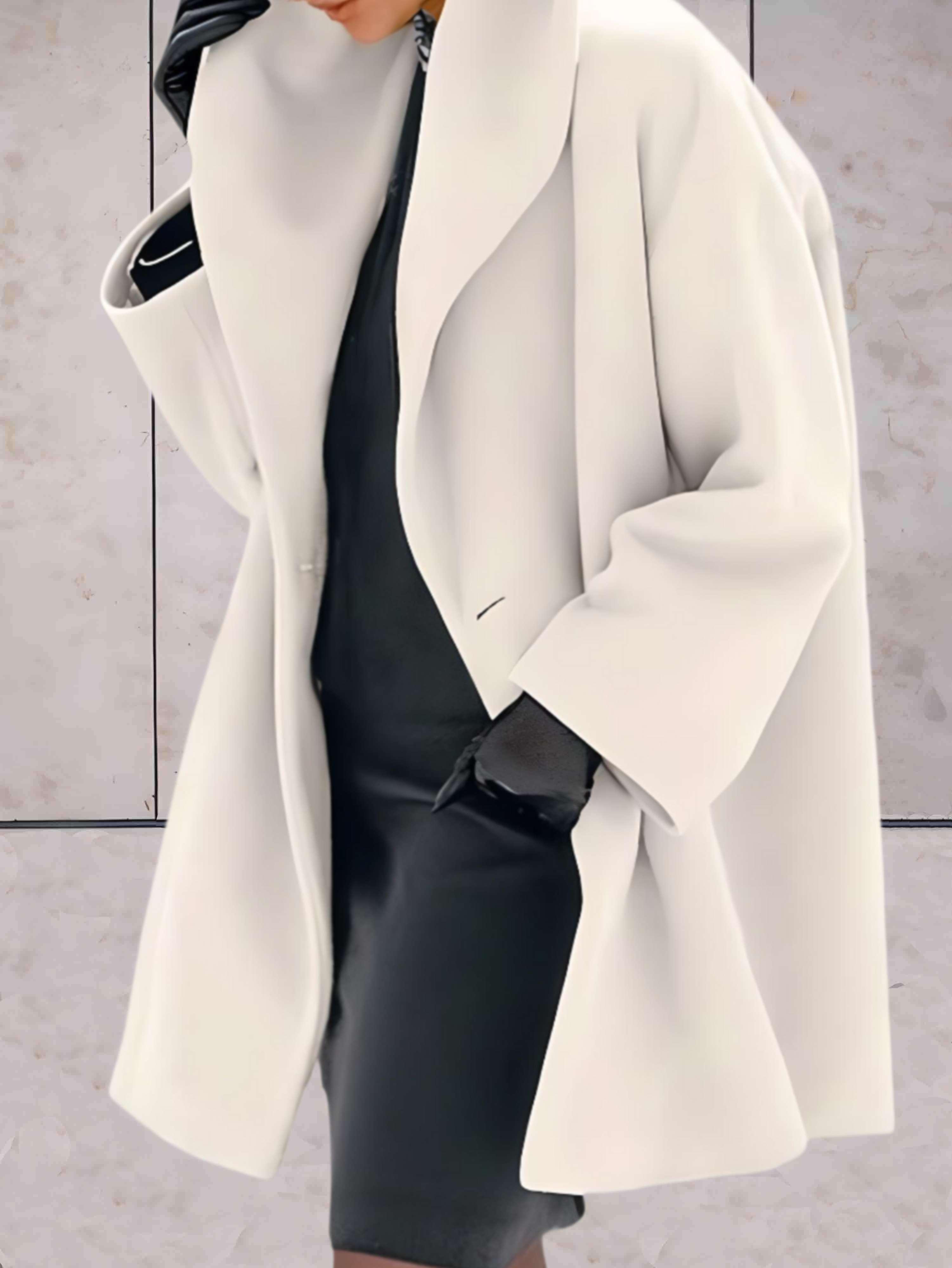 Women's open front winter coat with wide lapels and flared cuffs