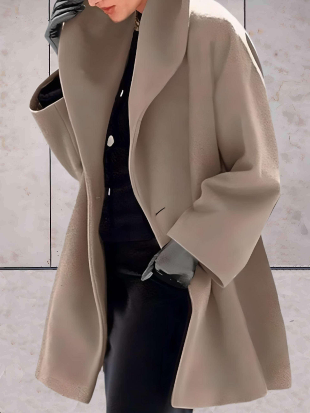 Women's open front winter coat with wide lapels and flared cuffs