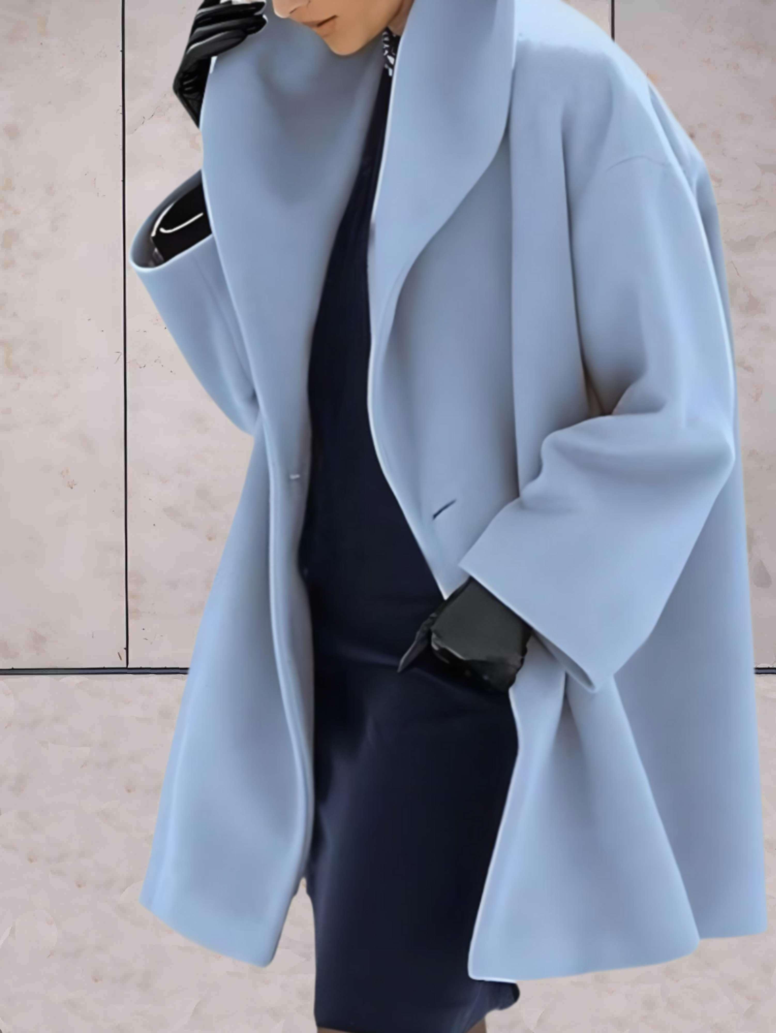 Women's open front winter coat with wide lapels and flared cuffs
