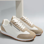Women's panelled lace-up trainers with round toes and low flat soles