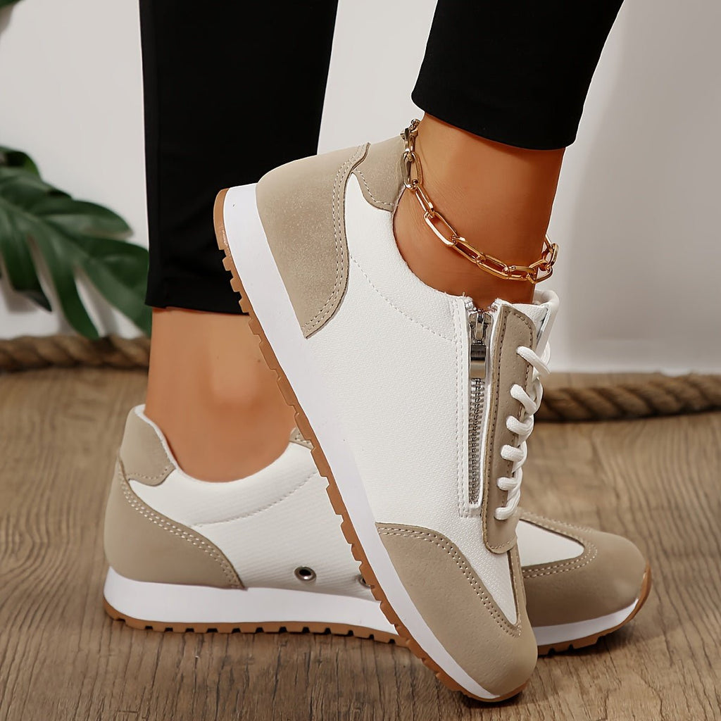 Women's panelled lace-up trainers with round toes and low flat soles