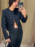 Women's black cropped military jacket with long sleeves and button details