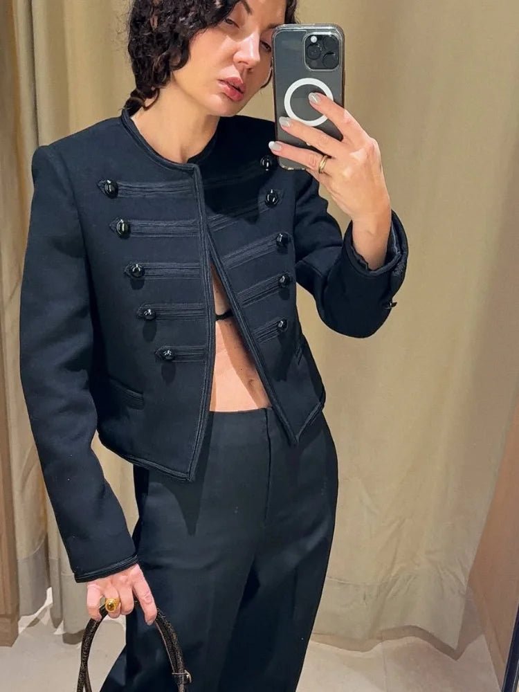 Women's black cropped military jacket with long sleeves and button details