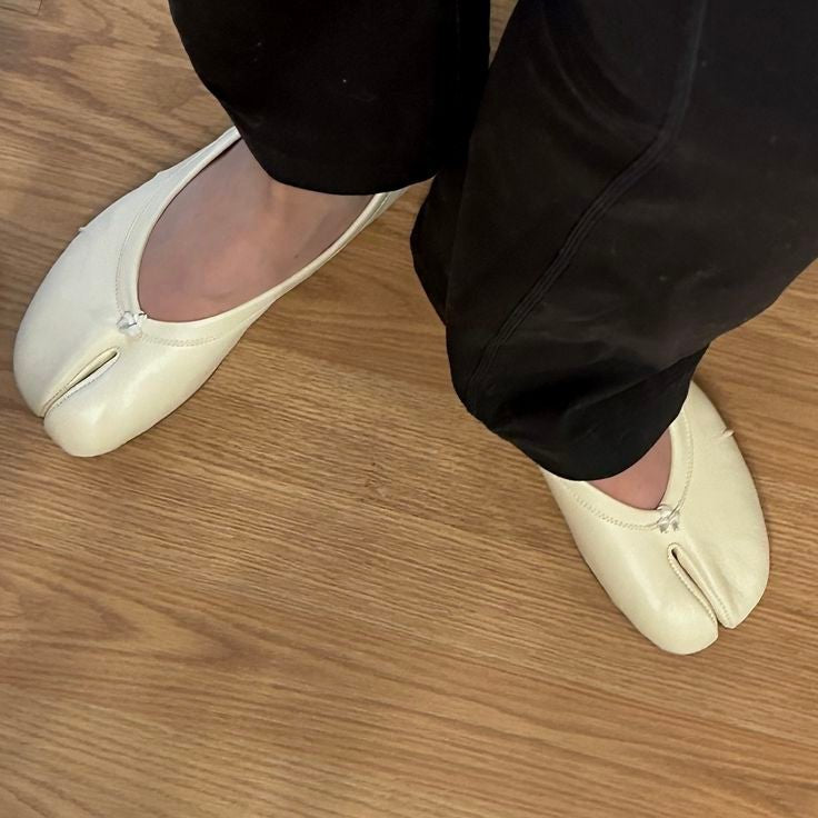 Women's split-toe ballet flats with rounded toes and flat soles
