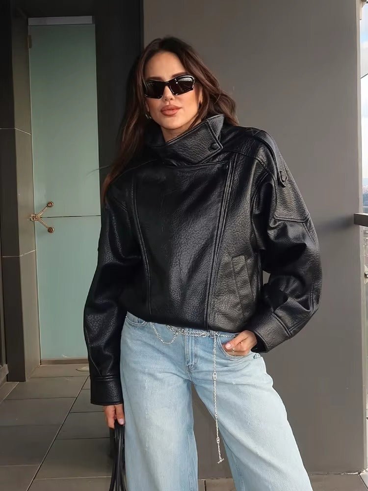 Women's asymmetrical jacket with high collar, long sleeves and diagonal front fastening