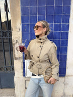Women's cropped trench jacket with stand collar, button front and tie belt