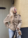 Women's cropped trench jacket with stand collar, button front and tie belt