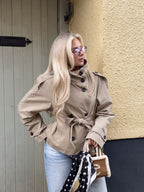 Women's cropped trench jacket with stand collar, button front and tie belt