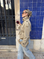 Women's cropped trench jacket with stand collar, button front and tie belt