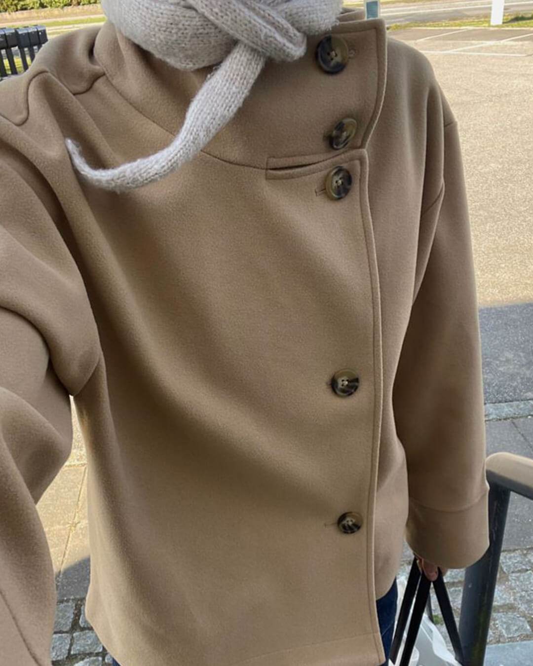 Women's stand collar button jacket with long sleeves and hip-length cut