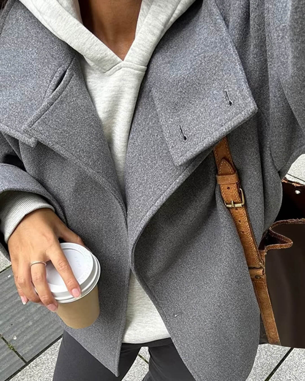 Women's stand collar button jacket with long sleeves and hip-length cut