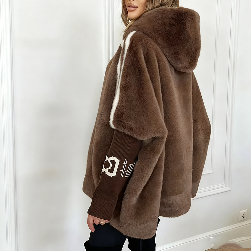 Women's oversized textured hooded winter jacket with striped sleeves