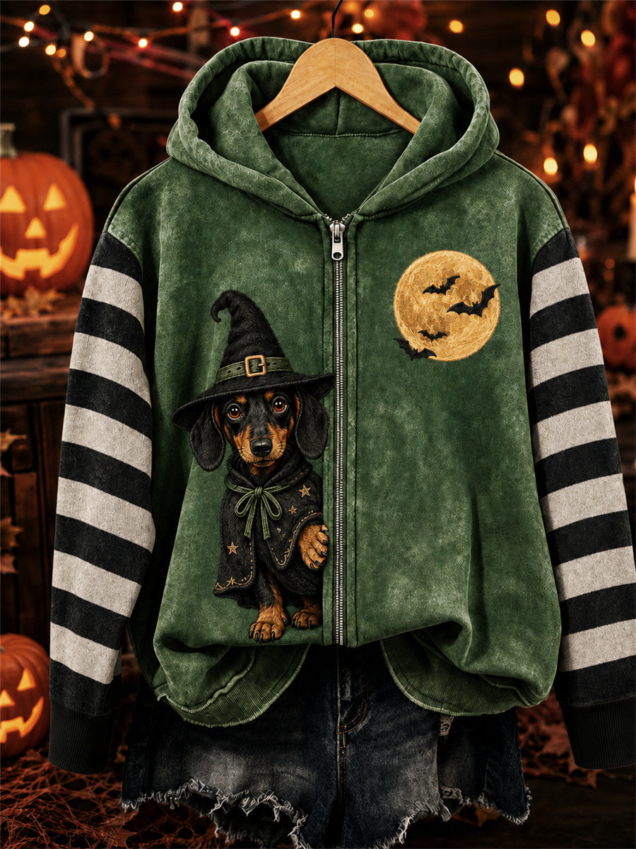 Green women's hoodie with striped sleeves and a Halloween dachshund witch graphic