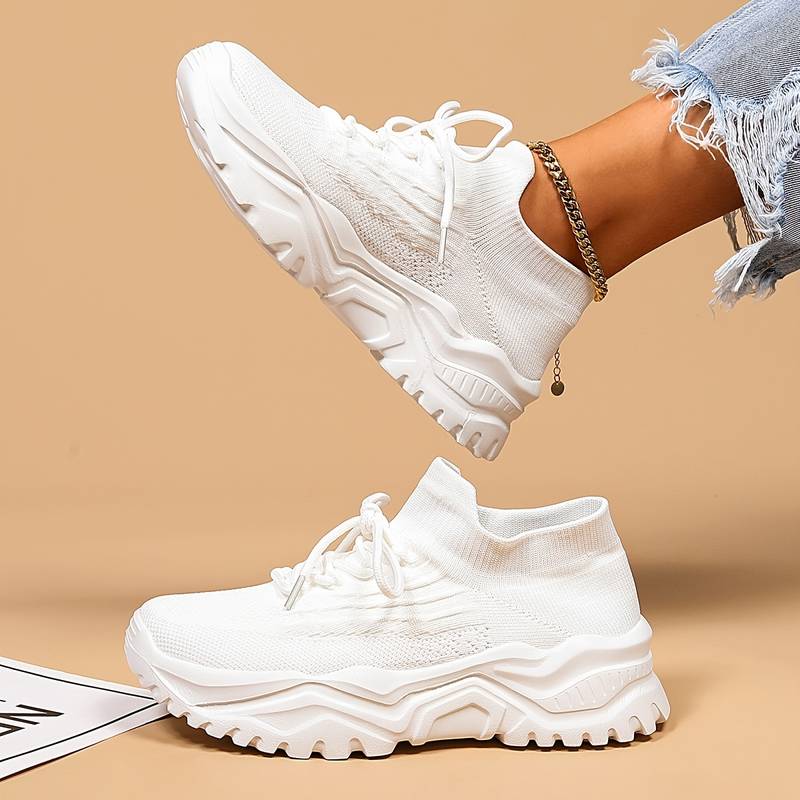 Women's lace-up knit trainers with chunky ridged soles