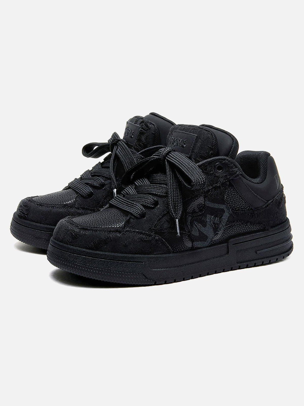 Black high-top skate sneakers with tonal camouflage side panels and lace-up fronts