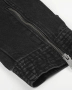 Men's black stand collar denim jacket with zip fastening and button detailing